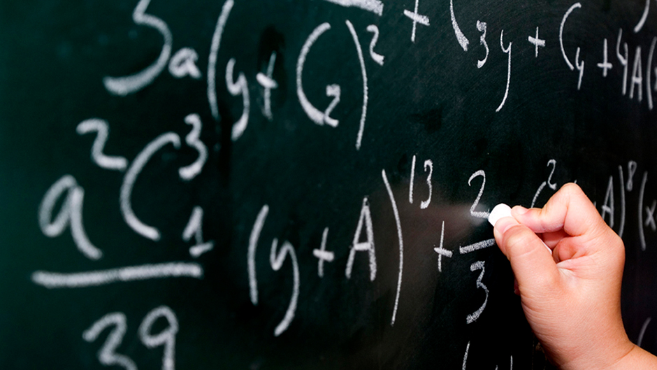 Math equation on a chalkboard